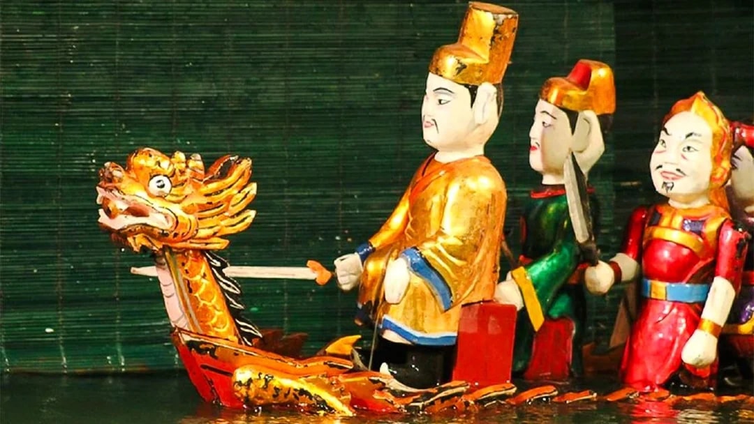 Royal puppet on golden dragon boat at Thang Long Water Puppet Show, Hanoi.