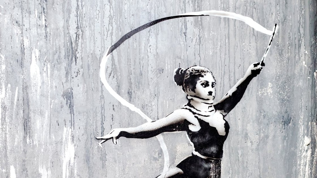 Ballet dancer graffiti art at The Banksy Museum.