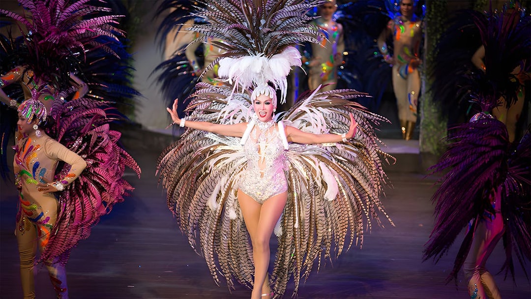 Performer in elaborate costume at Colosseum Show Pattaya.
