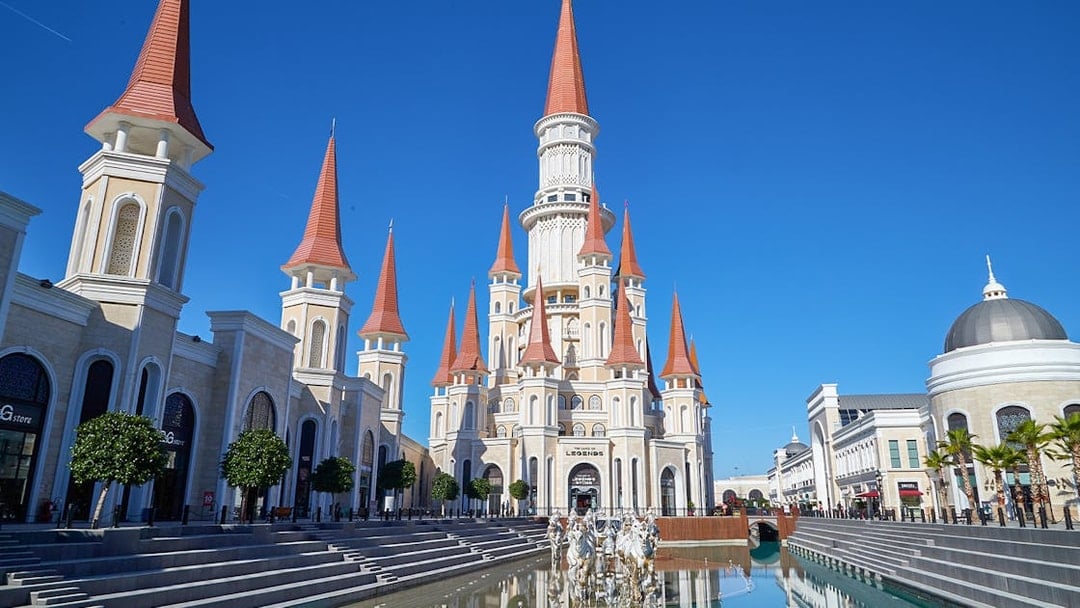 Land of Legends Theme Park castle and canal in Antalya, Turkey.