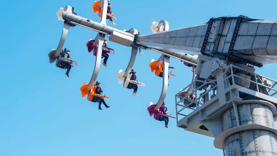 Visitors on a thrilling ride at The Land of Legends Theme Park.
