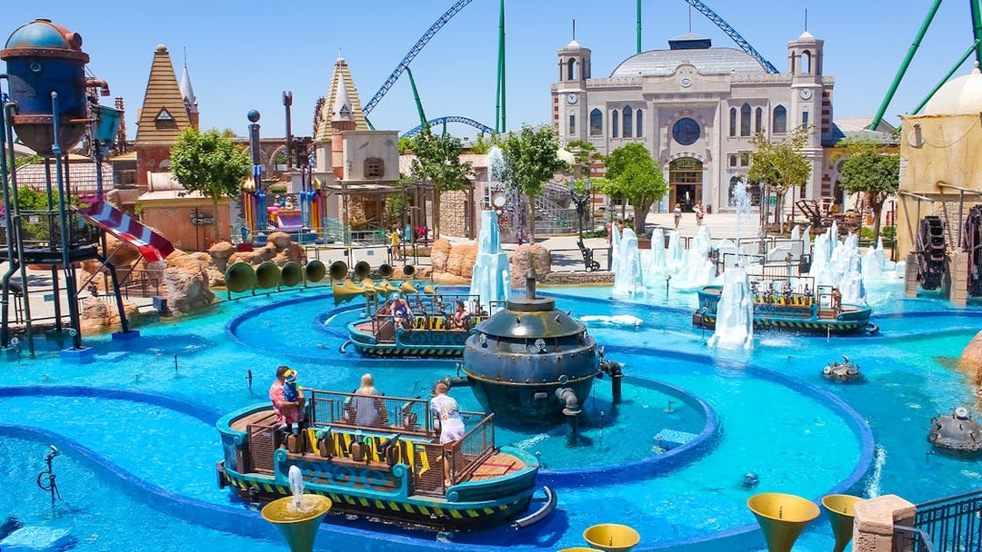 Boats navigating water ride at Land of Legends Theme Park, Antalya.