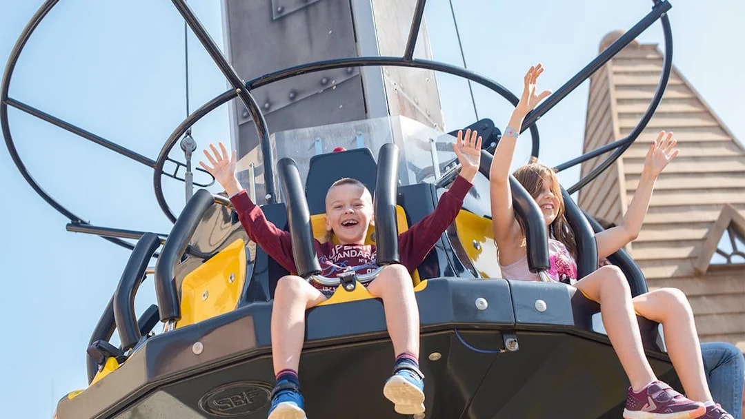 Children enjoying a ride at Land of Legends Theme Park, Antalya.