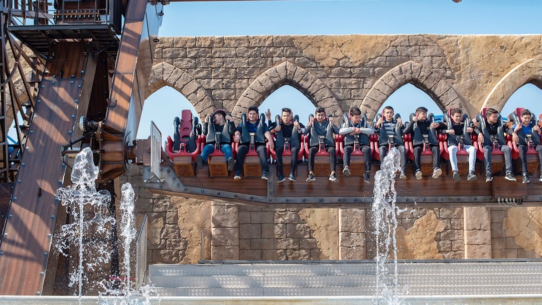 Visitors on a water ride at The Land of Legends Theme Park.