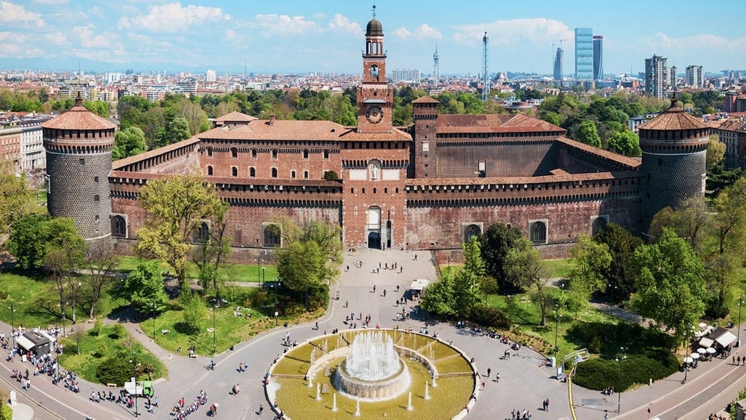 Aerial view of Sforza Castle in Milan with surrounding park and fountain.
