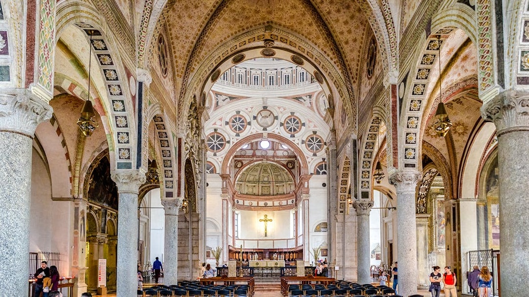 Interior of Church Santa Maria delle Grazie, Milan, showing ornate arches and altar.