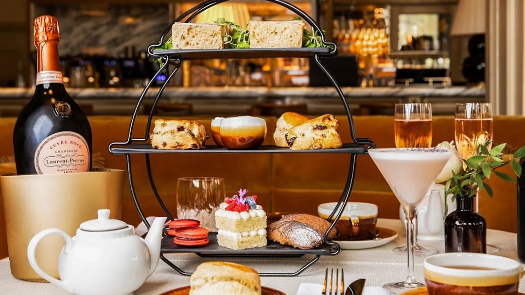 Afternoon tea set with sandwiches, scones, and pastries at the National Gallery London.