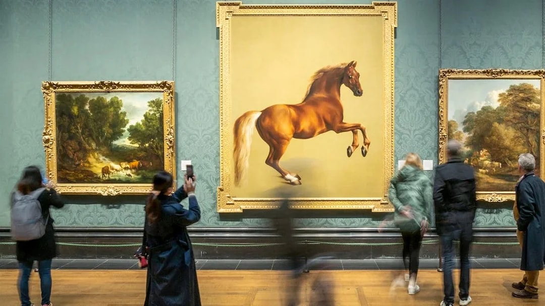 Visitors viewing paintings at the National Gallery, including a prominent horse artwork.