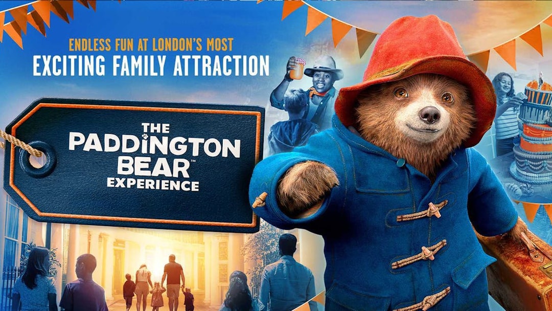 Paddington Bear statue at Paddington Station, London, promoting The Paddington Bear Experience.