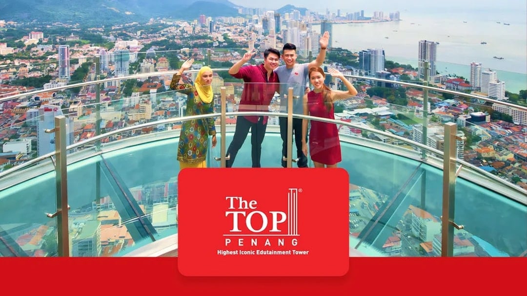 Visitors enjoying the view from The TOP Penang's observation deck.
