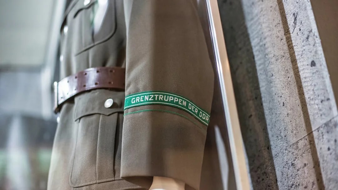 East German border troops uniform at The Wall Museum East Side Gallery.