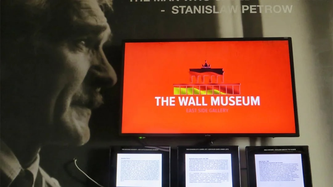 The Wall Museum East Side Gallery exhibit featuring Stanislav Petrov display.