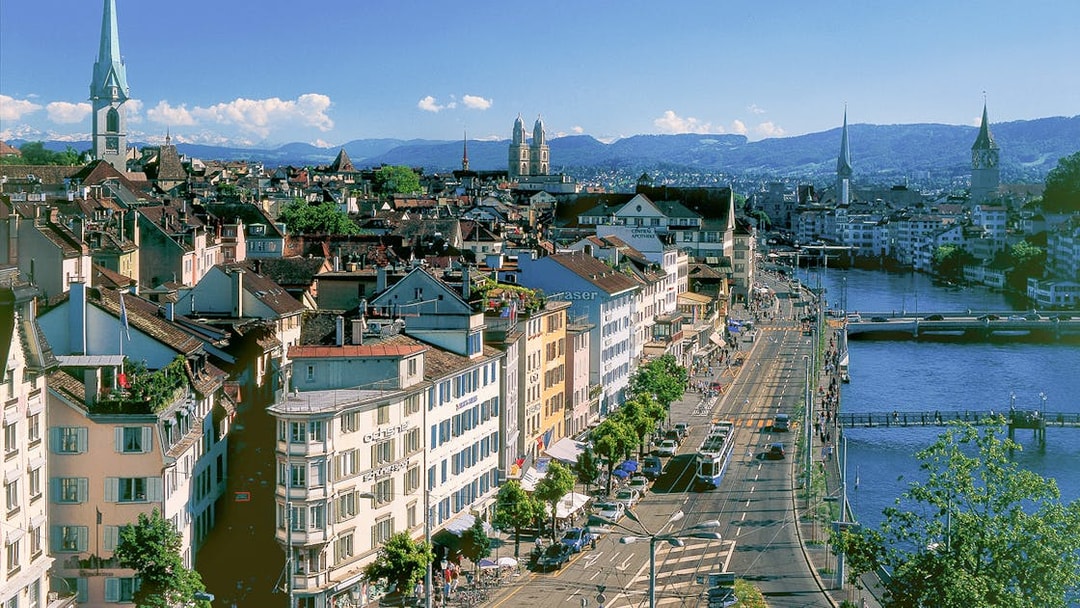 Aerial view of Zurich's historic district with Fraumünster Church and Limmat River, part of The ZURICH Experience Tour.