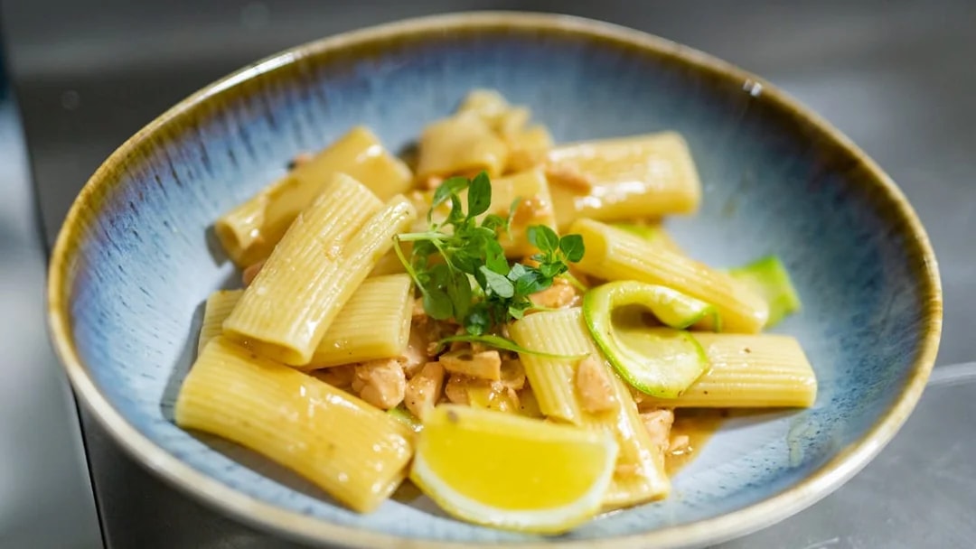 Fresh pasta with lemon and herbs on a brunch cruise in Paris.