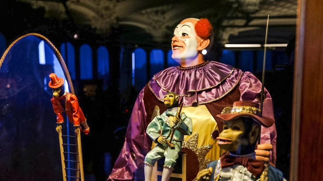 Automaton display with clown and monkey figures at Tibidabo Amusement Park museum.