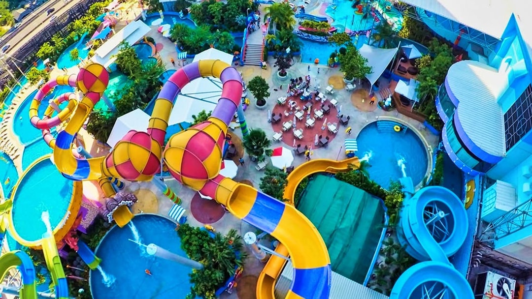 Pororo AquaPark Bangkok aerial view with colorful water slides and pools.