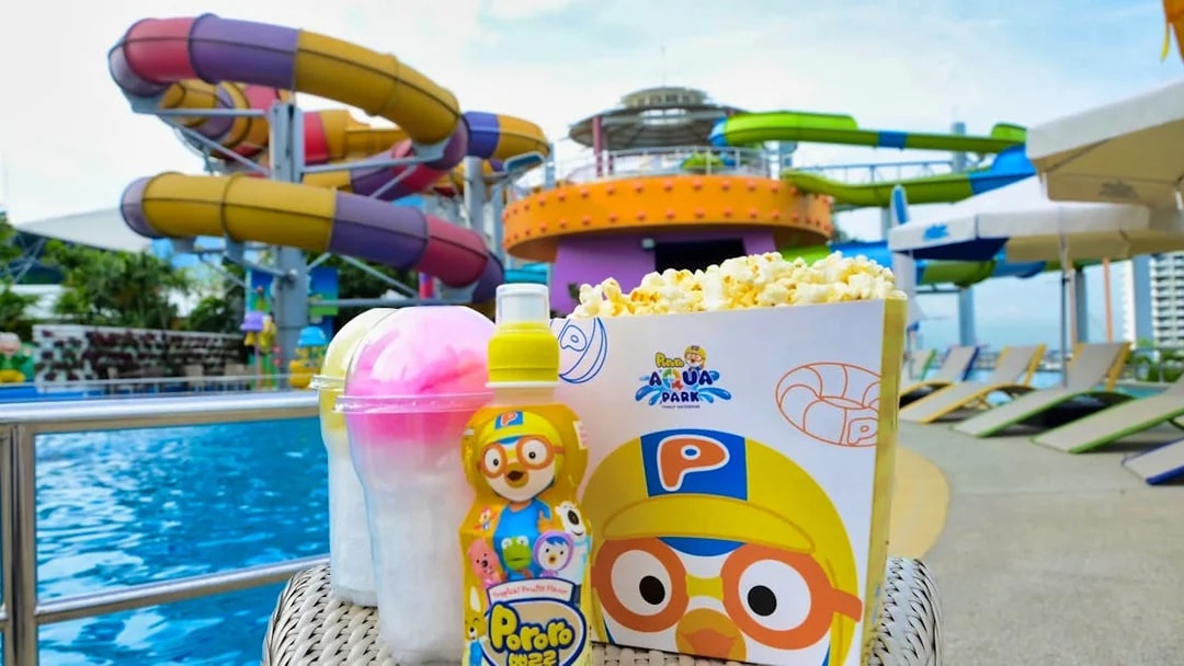 Pororo AquaPark Bangkok with colorful water slides and poolside snacks.