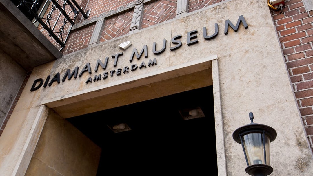 Entrance to the Diamond Museum in Amsterdam with signage above the doorway.