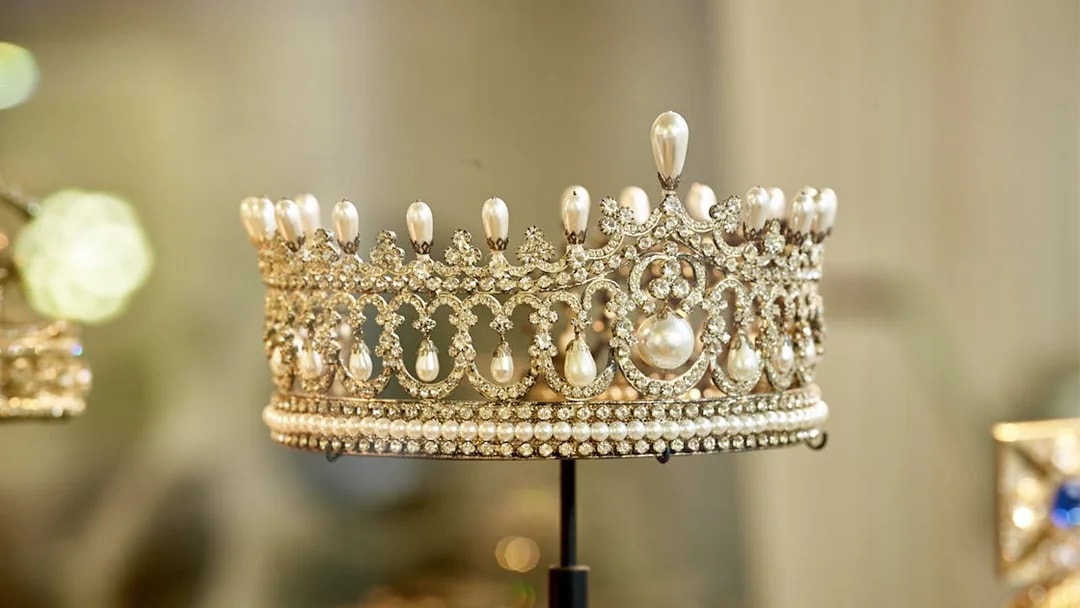Ornate pearl and diamond crown on display at Diamond Museum Amsterdam.