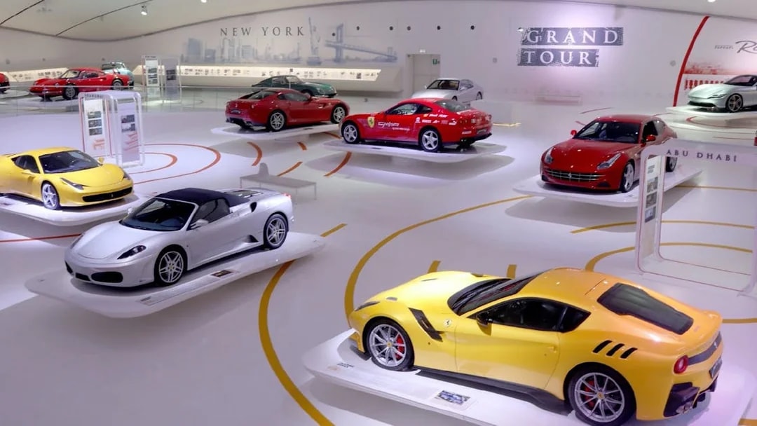 Ferrari cars on display at Museo Enzo Ferrari Modena exhibition hall.