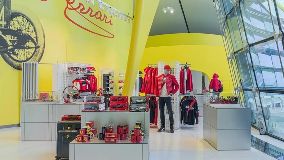 Ferrari merchandise display at Museo Enzo Ferrari Modena.