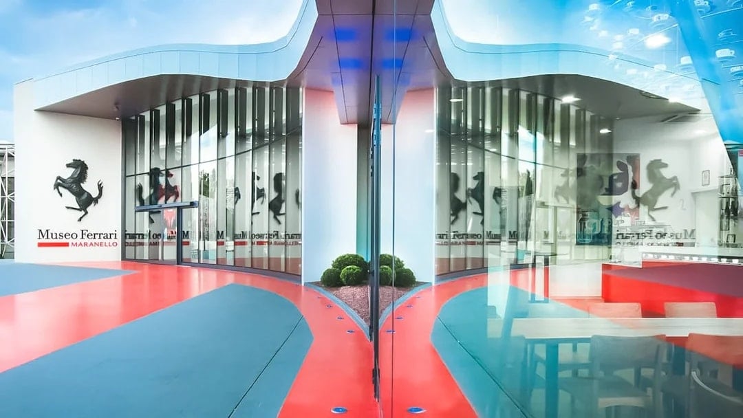 Ferrari Museum Maranello entrance with red and blue pathway.