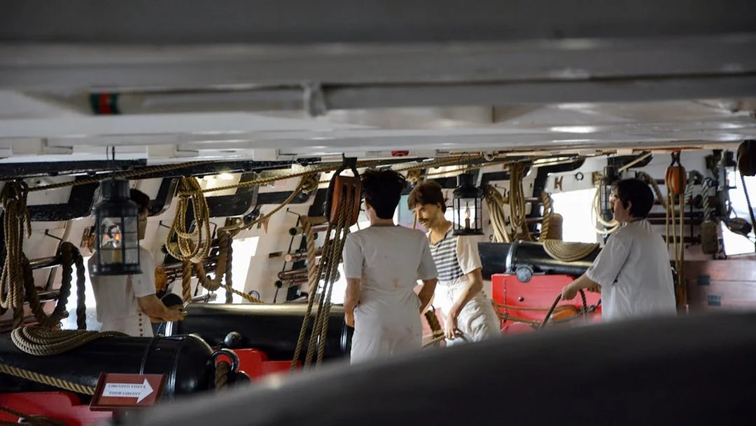 Crew members working on the deck of Frigate D. Fernando II e Glória, Lisbon.