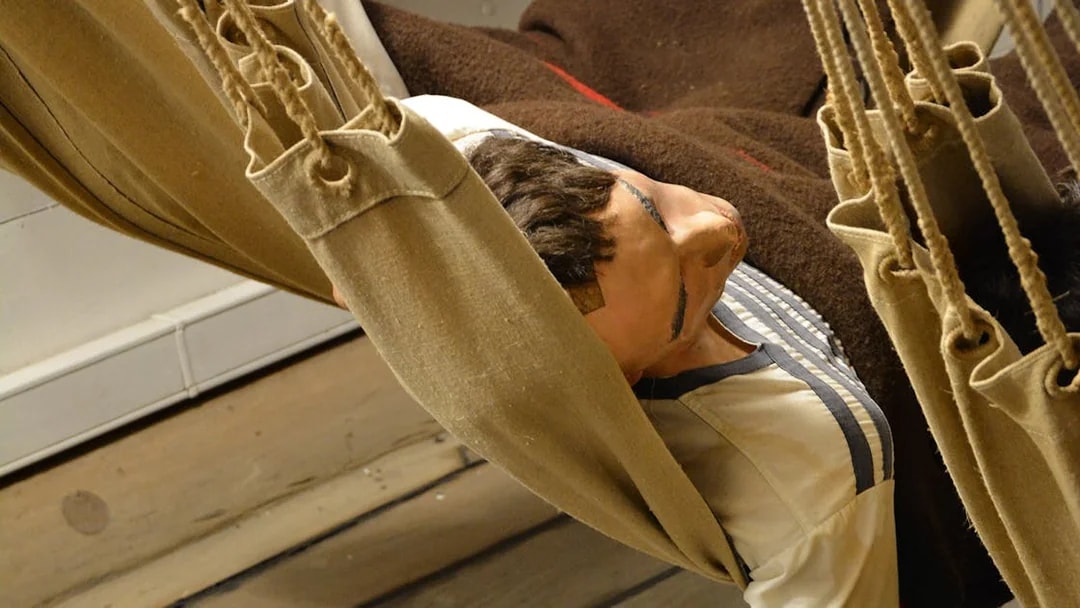 Crew member mannequin in hammock on Frigate D. Fernando II e Glória.