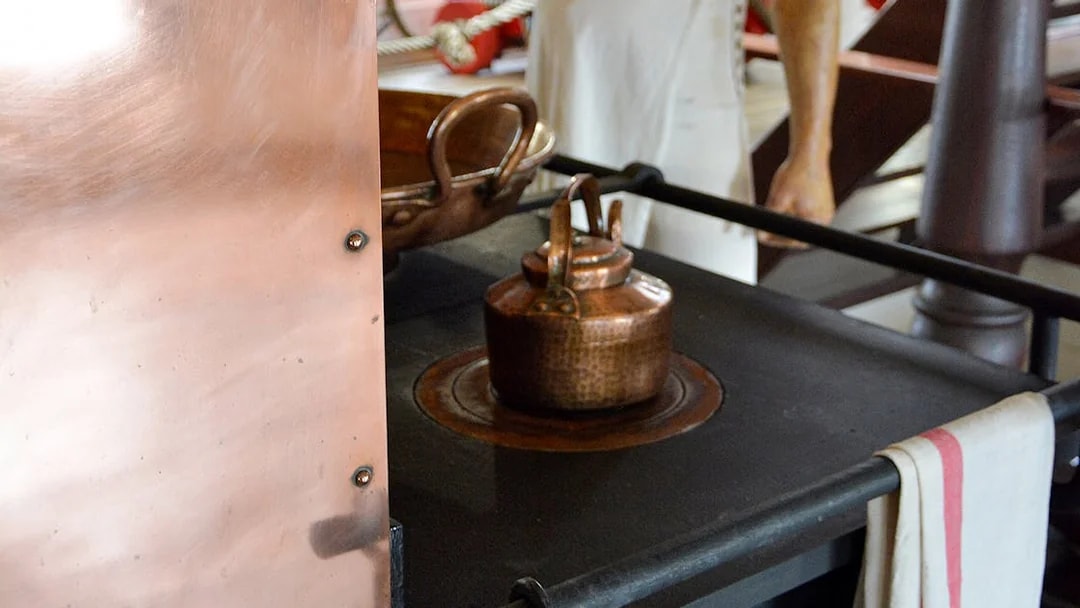 Copper kettle on stove aboard Frigate D. Fernando II e Glória.