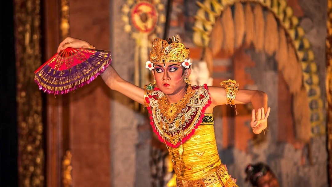Dancer performing Legong dance at Ubud Palace, Bali.