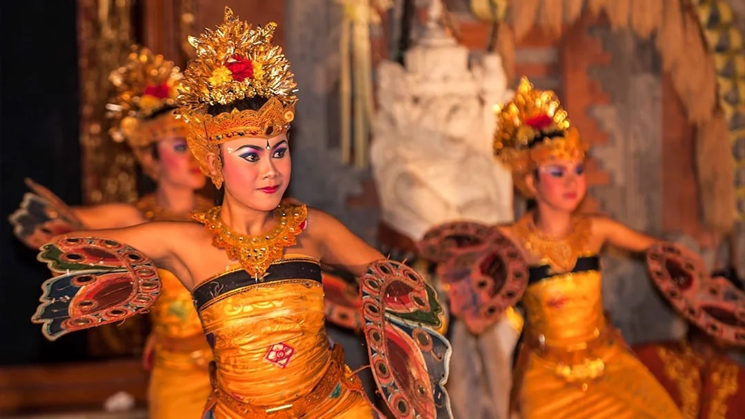Traditional Legong dancers performing at Ubud Palace, Bali.