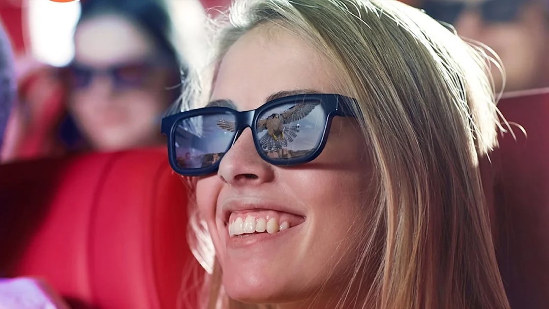 Visitor enjoying Malta 5D audio-visual show with 3D glasses.
