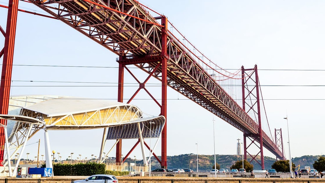 Lisbon's Ponte 25 de Abril bridge with Pilar 7 Experience viewpoint.