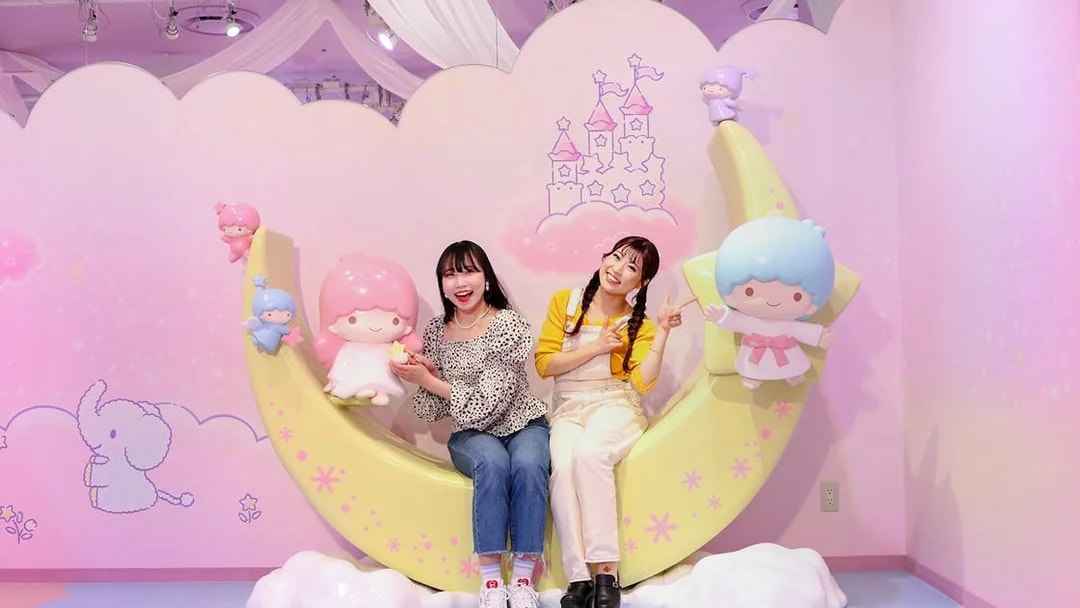 Visitors enjoying Sanrio Puroland's Little Twin Stars display in Tokyo.