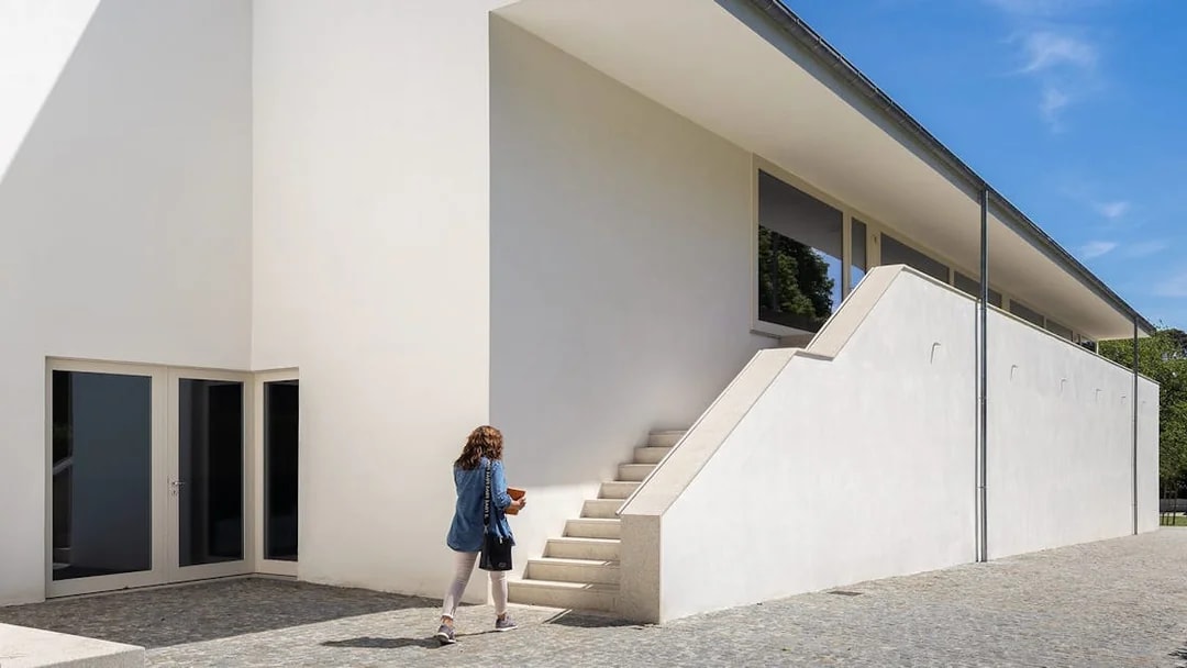 Visitor approaching modern architecture at Serralves, Porto.