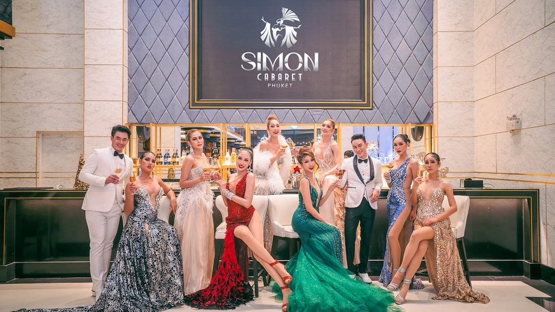 Performers in elegant costumes at Simon Cabaret Show, Phuket.