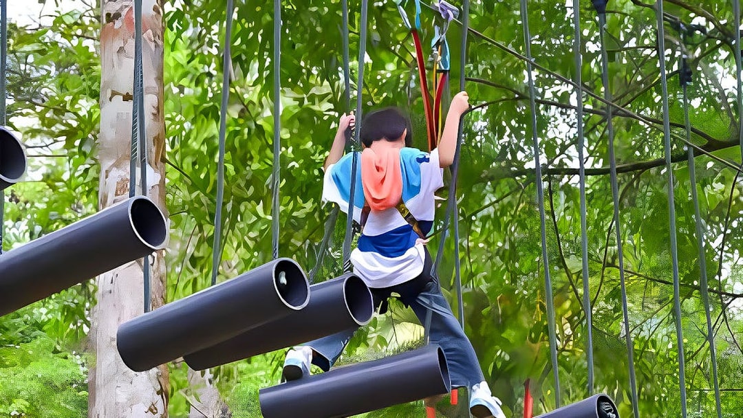 Person navigating obstacle course at Skytrex Adventure Langkawi.