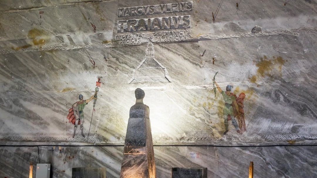 Slanic Prahova Salt Mine interior with Roman carvings and statue, near Bucharest.