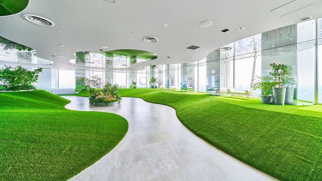 Sunshine 60 Observatory Tenbou Park interior with green artificial hills and plants.
