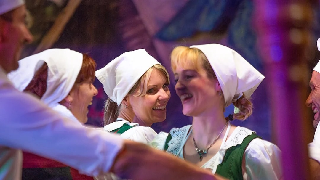 Traditional Tyrolean dancers in folk attire at the Gundolf Family show.