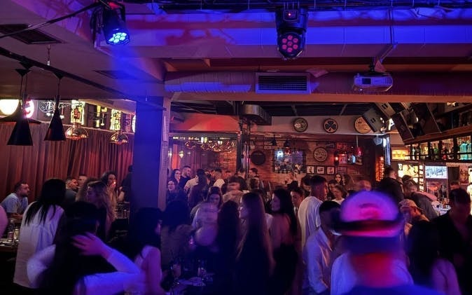 Tirana Pub Crawl: Guided Nightlife Tour with Entry to Three Venues, Welcome Drinks, and DJ Entertainment Image 3