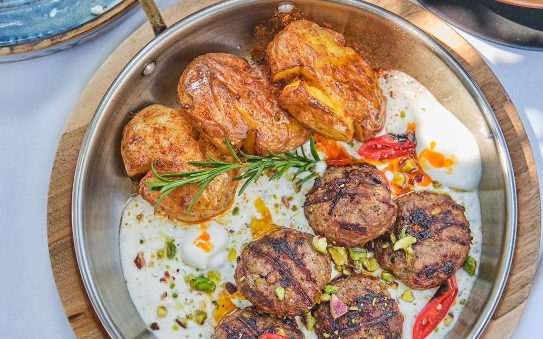 Tirana Street Food and Landmarks Guided Walking Tour – 6 Dishes, 1 Sweet, Dhalle, and Water Image 7