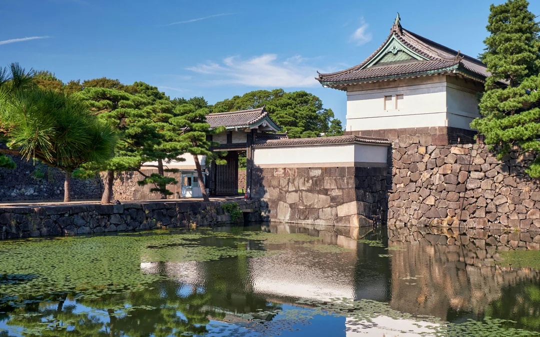Kikyo-bori moat with water plants near Tokyo Imperial Palace, Japan.
