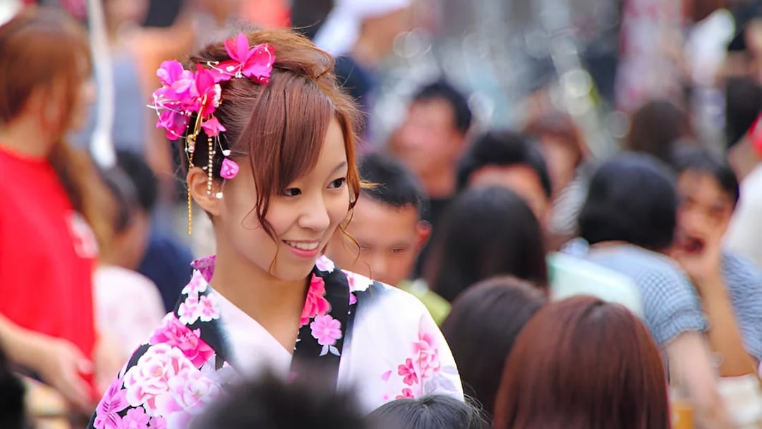 Person in floral kimono at Asakusa, Tokyo during full day rental experience.