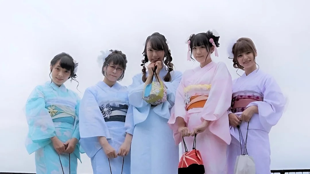 Group wearing kimonos in Asakusa, Tokyo, during a full-day rental experience.