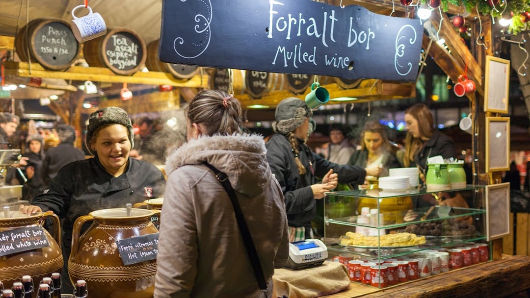 Mulled wine stall at a Christmas market during the Christmas Lights Tour.