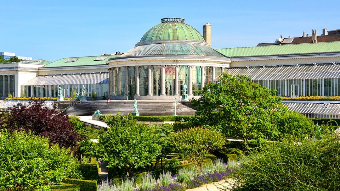 Botanical Garden of Brussels with glass-domed greenhouse on hop-on hop-off bus tour.
