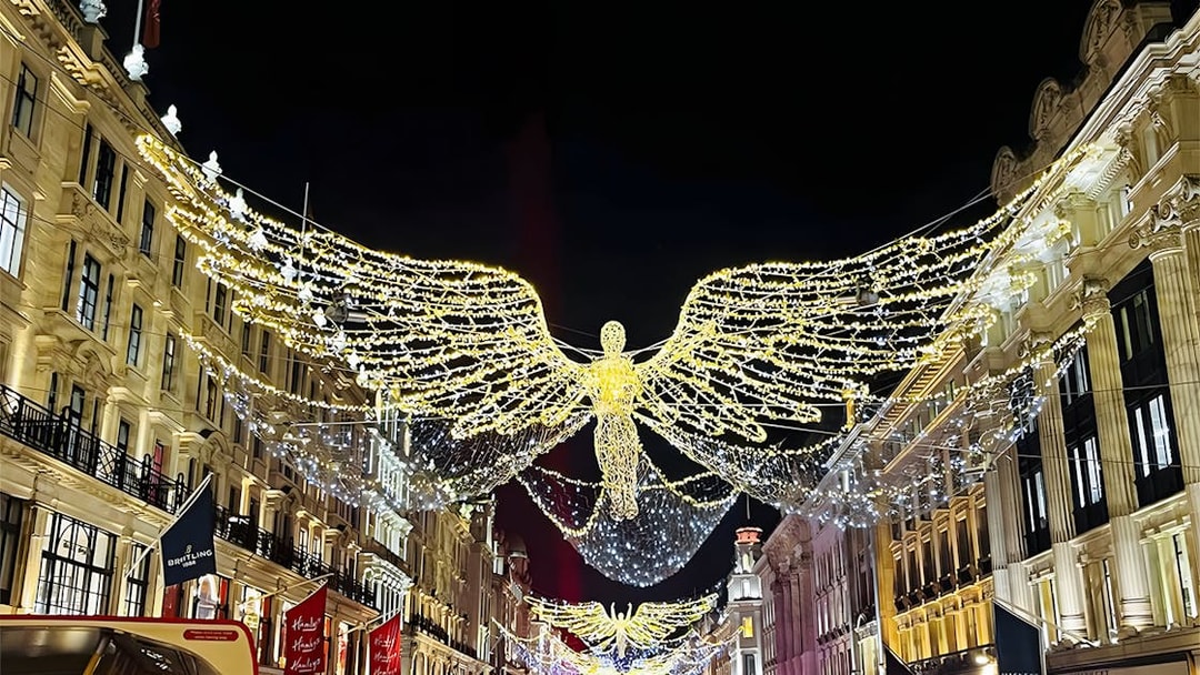 London Christmas lights display with angel decorations on Regent Street.