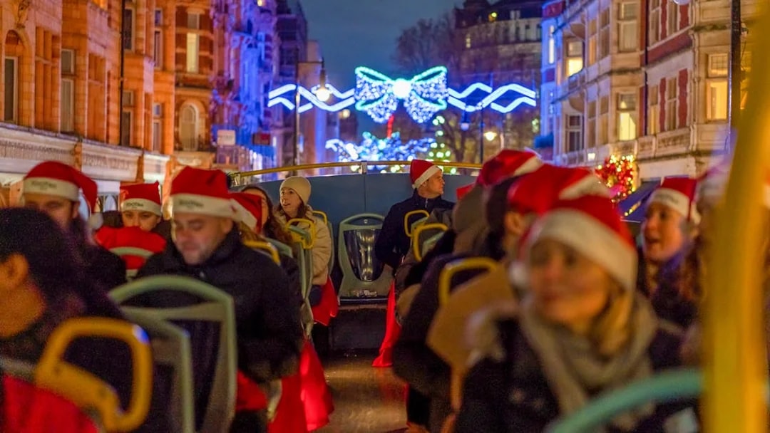 Double-decker bus tour of London Christmas lights on Regent Street.