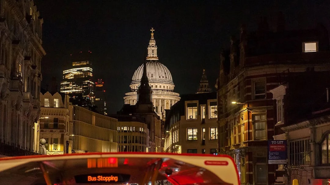 London night view from Tootbus with St. Paul's Cathedral in the background.